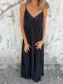 Close-up of a black lace-trimmed V-neck camisole maxi dress worn by a model outdoor - S / Single Item / Black