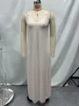 Detailed close-up view of a long pink silk-like lace slip dress displayed on a mannequin - S / Single Item / Light Pink