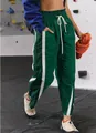 Women's green Y2K style sports pants with high waist drawstring and white side stripes - S / Bottoms / Green