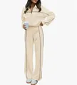 Detailed view of women's cream two-piece tracksuit with black piping and zipper jacket - S / Top And Bottom / Apricot