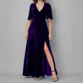 Detail of elegant purple velvet V-neck maxi dress with high slit and flutter sleeves - S / Purple