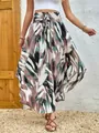 Detailed view of bohemian floral print skirt with elastic smocked waist and tie - S / Bottoms / Pink and Green