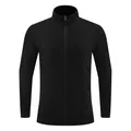 Close-up of a sleek black athletic jacket with ribbed sleeve detailing - S / Tops / Black