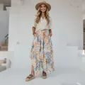 Gonna midi bohémien a fiori per le vacanze estive, design fluido e stampa colorata - Arcobaleno