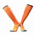Close-up of bright orange soccer socks with grey reinforced heel and toe detail - Kids Orange / One Size
