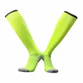 Detail view of neon green football socks featuring thick towel bottom and black striped cuffs - Kids Neon Green / One Size