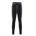 Professional detail view of black children's compression leggings with green side stripes - S / Bottoms / Black/Green