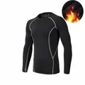 Black fleece-lined long sleeve compression shirt with grey stitching for sports and gym. - S / Tops / Light Fleece Lined / Black and Gray