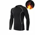 Black fleece-lined long sleeve compression shirt with grey stitching for sports and gym. - S / Tops / Light Fleece Lined / Black and Gray