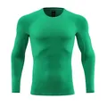 Detailed view of bright green compression shirt with durable raglan sleeve stitching - S / Tops / Fruit Green