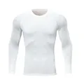 Detailed view of white long-sleeved compression shirt with athletic quick-dry fabric - Size 22 / Tops / White