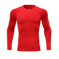 Detail view of red long-sleeved quick-dry compression shirt for sports and fitness training - Size 22 / Tops / Red