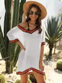 Boho style white V-neck beach cover-up with colorful crochet trim details on a model. - L / Tops / White