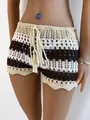 Detailed view of crochet knit beach shorts featuring tassel drawstring and color block stripes - M / Bottoms / Brown