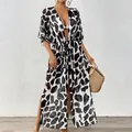 Detaillierte Ansicht eines Damen-Strand-Cover-ups aus Mesh mit Kuhmuster-Drucken - S / Oberteile / Schwarz