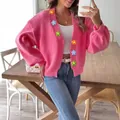 Vibrant pink knitted cardigan for women featuring 3D handmade crocheted flower details - S / Tops / Rose Red