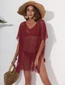 Detail shot of a burgundy mesh beach cover-up with tassel decoration. - One Size / Wine Red