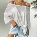 Close-up of white sheer off-shoulder top with a bow tie detail for beachwear. - One Size / Tops / White