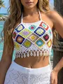 Detailed view of colorful handmade crochet patchwork crop top with elegant faux pearl tassels - One Size / Tops / White