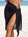Detailed view of black chiffon beach sarong featuring a decorative gold flower accessory - One Size / Bottom (Metal Flower) / Black
