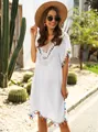Detail view of white V-neck beach cover-up with colorful tassels and crochet - One Size / Tops / White