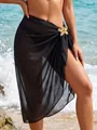 Close-up of black chiffon beach sarong with elegant gold starfish metal accessory - Black Line Starfish (Bottom) / One Size