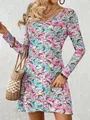 Close-up detail of women's long-sleeve paisley print A-line dress with stylish boho bag - S / Tops / Pink Blue Print