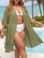 Olive green plus size ruffle sleeve cardigan beach cover-up shown in outdoor resort setting - One Size / Tops / Army Green