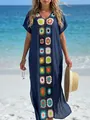 Gedetailleerd overzicht van donkerblauwe strandcover-up met kleurrijke gehaakte bloemen - Eén maat / Boven- En Onderstuk / Marineblauw