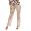 Vista dettagliata dei pantaloni da spiaggia in crochet beige con motivo traforato. - Taglia S / Pantaloni e gonne / Albicocca
