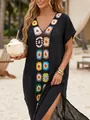 Detailed view of a black beach cover-up featuring colorful crochet flower patchwork. - One Size / Top And Bottom / Black