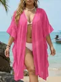 Detailed view of a vibrant pink ruffle beach cover-up worn over a white bikini outdoors - One Size / Tops / Rose Red