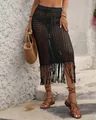 Women's black crochet cover up skirt featuring a drawstring waist and tassel fringe hem - S / Bottoms / Black