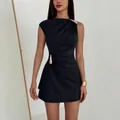 Detail view of a black sleeveless bodycon mini dress with elegant gold metal buckles - S / Top And Bottom / Black