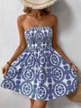 Elegant women's strapless mini dress with blue floral print and flared skirt - S / Dress (F085) / Blue