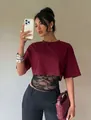 Chic burgundy women's short sleeve t-shirt featuring elegant black lace patchwork detail - Burgundy