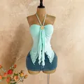 Elegant light blue mesh halter top with ruffled irregular hem and gold flower detail. - S / Tops / Teal