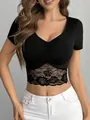 Elegant V-neck lace patchwork crop top with short sleeves and slim fit design. - S / Tops / Black