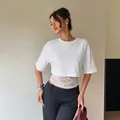 Women's white short-sleeve crop top featuring elegant lace splicing and slim fit design - S / Tops / White