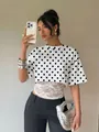 Trendy white polka dot crop T-shirt for women with elegant white lace stitching detail - S / Tops / White with Black Polka Dots