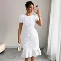 Elegant white floral textured slim fit bodycon knee-length dress with ruffled hem - S / White
