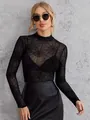Detail view of a sexy black sheer mesh long sleeve top with spider web pattern. - S / Tops / Black