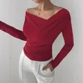 Elegant red long sleeve off-shoulder wrap top featuring stylish ruched fabric detail - S / Tops / Red