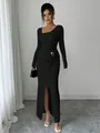 Elegant black maxi dress with irregular neckline and textured knit for fall winter fashion - S / Bottoms / Black