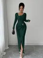 Elegant dark green textured knit maxi dress with asymmetrical neckline and waist buckle - S / Bottoms / Dark Green