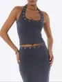 Close-up of grey halter crop top and skirt set with metal eyelet details on U-neck - S / Tops / Gray