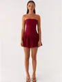 Full front view of an elegant wine red strapless pleated mini dress worn by a model - Red
