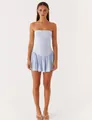 Front view of light blue strapless tube mini dress with ruffled hem on female model - S / Blue
