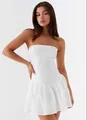 Elegant white strapless mini dress featuring a corset bodice and pleated hemline - S / Top And Bottom / White