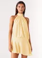 Detailed front view of a stylish yellow halter neck sleeveless mini dress on a model - S / Tops / Yellow